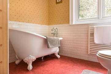 The second bathroom on the first floor, with a gorgeous free-standing bath.