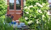 The patio at the front is the perfect spot for a cup of tea, whilst listening to the bird song. - Thumbnail Image