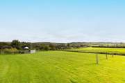Exercise your dog here, it is shared with the farmhouse. You can see for miles in the heart of Cornwall's largest parish.