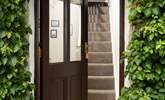 A warm welcome awaits at Mount Wise Cottage. Take care on the traditional cottage steps to the first floor. - Thumbnail Image