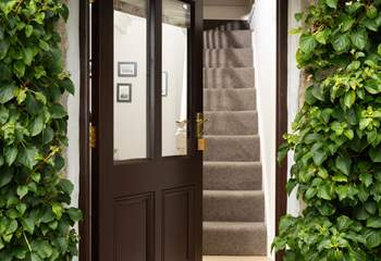 A warm welcome awaits at Mount Wise Cottage. Take care on the traditional cottage steps to the first floor.