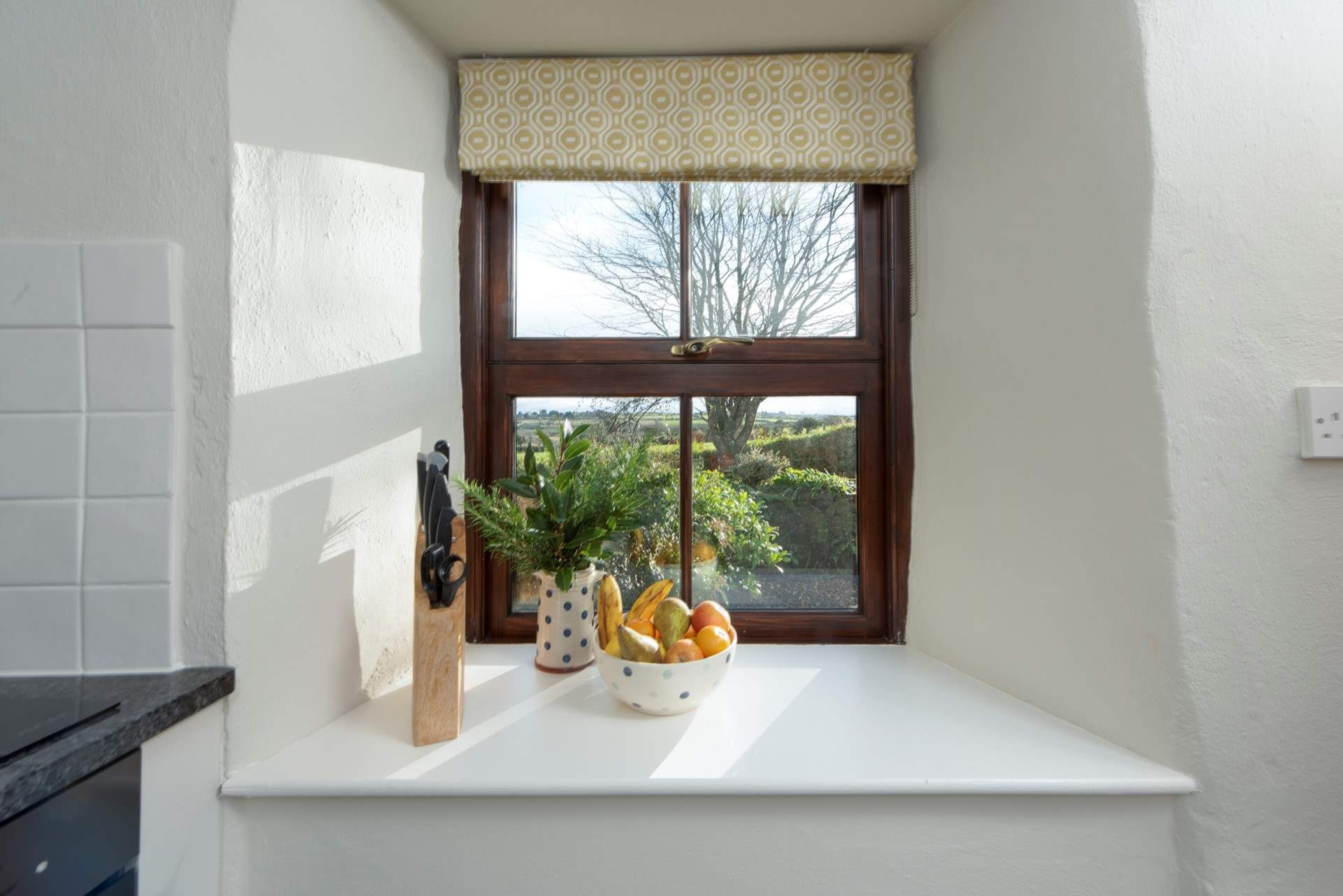 Look out towards the reservoir through these charming windows.