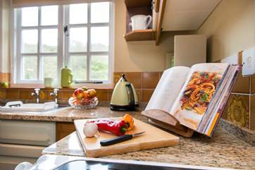 The kitchen also enjoys the beautiful views over the garden.