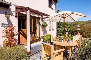 The door from the living-room leads out to the sunny patio-area.