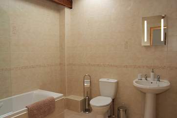 The spacious family bathroom.