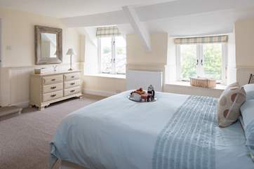 The master bedroom is super spacious, and is topped off with an en suite shower.