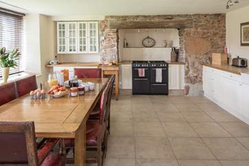 The spacious kitchen makes cooking and serving any meal a real pleasure.