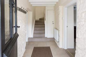 The entrance hall offers a great space to de-boot and hang your coats up ready to relax, bath and dine.