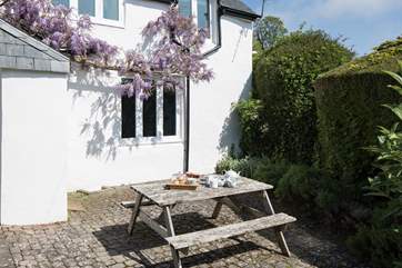 Dining al fresco on your private patio sun-trap is a must.