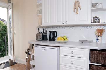 The modern kitchen is light and airy.