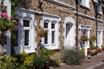 The main entrance to the apartments is the nearest door in the picture