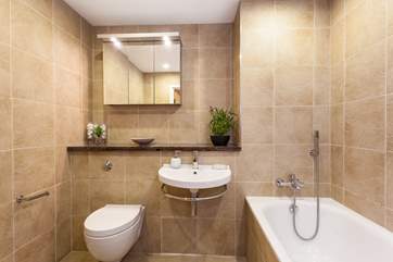 The super family bathroom- perfect for washing off sandy toes.