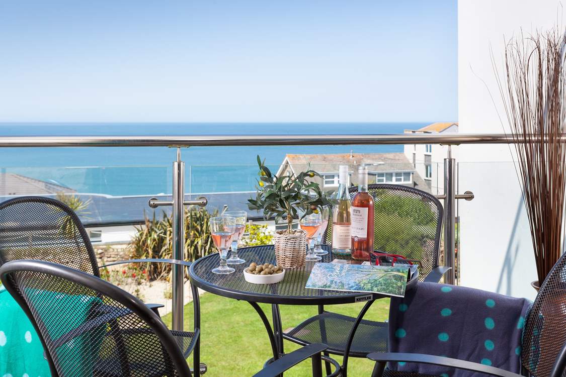 The balcony is the perfect spot for a glass of wine.