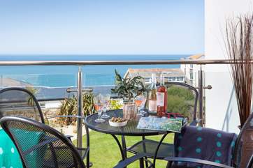 The balcony is the perfect spot for a glass of wine.