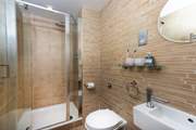 The en suite with modern shower.
