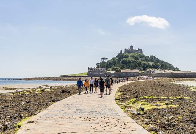 Walk across the causeway to St Michaels Mount in nearby Marazion.