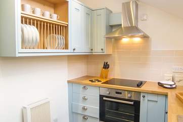 The kitchen is small but well-equipped.