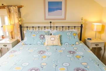 You can certainly stretch out and relax in this big bed!