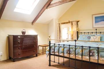 The bedroom is very spacious.