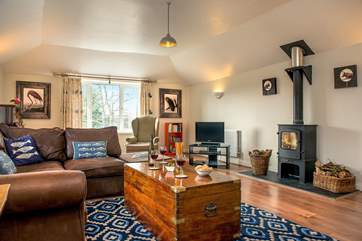 The toasty wood-burner makes this an ideal retreat whatever the weather.