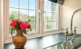 From the kitchen you can enjoy the view of the garden and the surrounding countryside. - Thumbnail Image