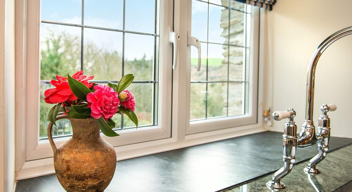 From the kitchen you can enjoy the view of the garden and the surrounding countryside.