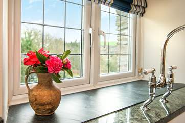 From the kitchen you can enjoy the view of the garden and the surrounding countryside.