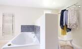 The en suite is partitioned from the dressing-area. - Thumbnail Image