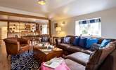 The wonderful open plan living-room makes for a very sociable holiday. - Thumbnail Image