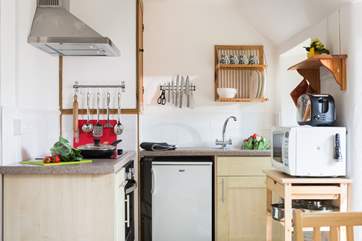 The kitchen is small but well-equipped.