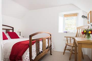 The comfortable bedroom-area with double bed.