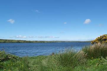 Beautiful calm looking waters, but it can get windy here which is why it is an excellent spot for windsurfing, beginners or experts.