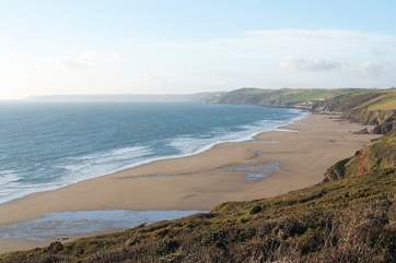 A footpath wends its way down the cliff to wonderful Long Sands below Tregantle Fort.