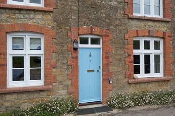 Parking is directly outside the cottage on this little village road.
