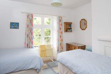 The twin room is L-shaped, the twin beds fit in very comfortably.