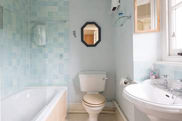 The family bathroom on the first floor, with shower over the bath.