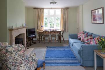 The dining-table looks onto the lane.