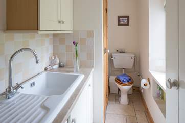 The ground floor utility-room and cloakroom.