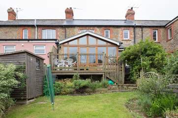 Looking back at the cottage from the enclosed rear garden.