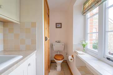 The ground floor utility-room and cloakroom.