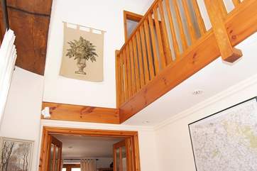The galleried landing creates space and light in this top class barn conversion.