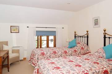 The pretty twin bedroom.