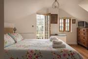 Bedroom 2 is a lovely light room.