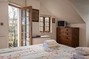 Bedroom 2 has a door out to a balcony.