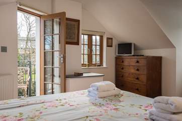 Bedroom 2 has a door out to a balcony.