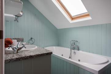 The family bathroom. Please note that the jacuzzi function of the bath is out of action, a new standard bath is due to be fitted over winter 2023.
