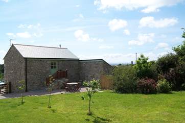 The spacious back garden is fully enclosed.