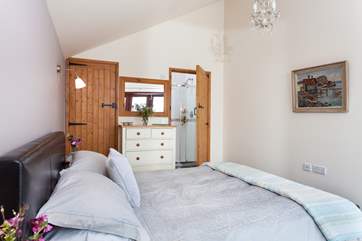 The master bedroom is full of light.