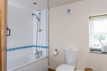 The en suite shower-room leads off from the master bedroom.