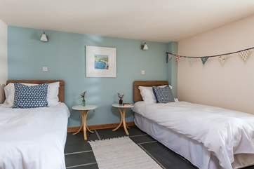 The pretty as a picture twin bedroom.
